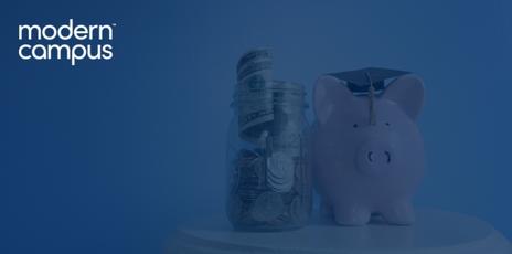 a clear cup filled with cash next to a pink piggy bank wearing a black grad cap